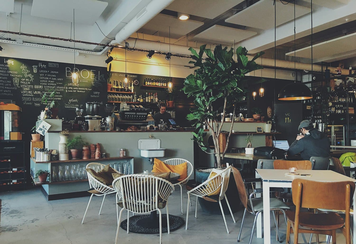 The warm interior of a busy specialty cafe