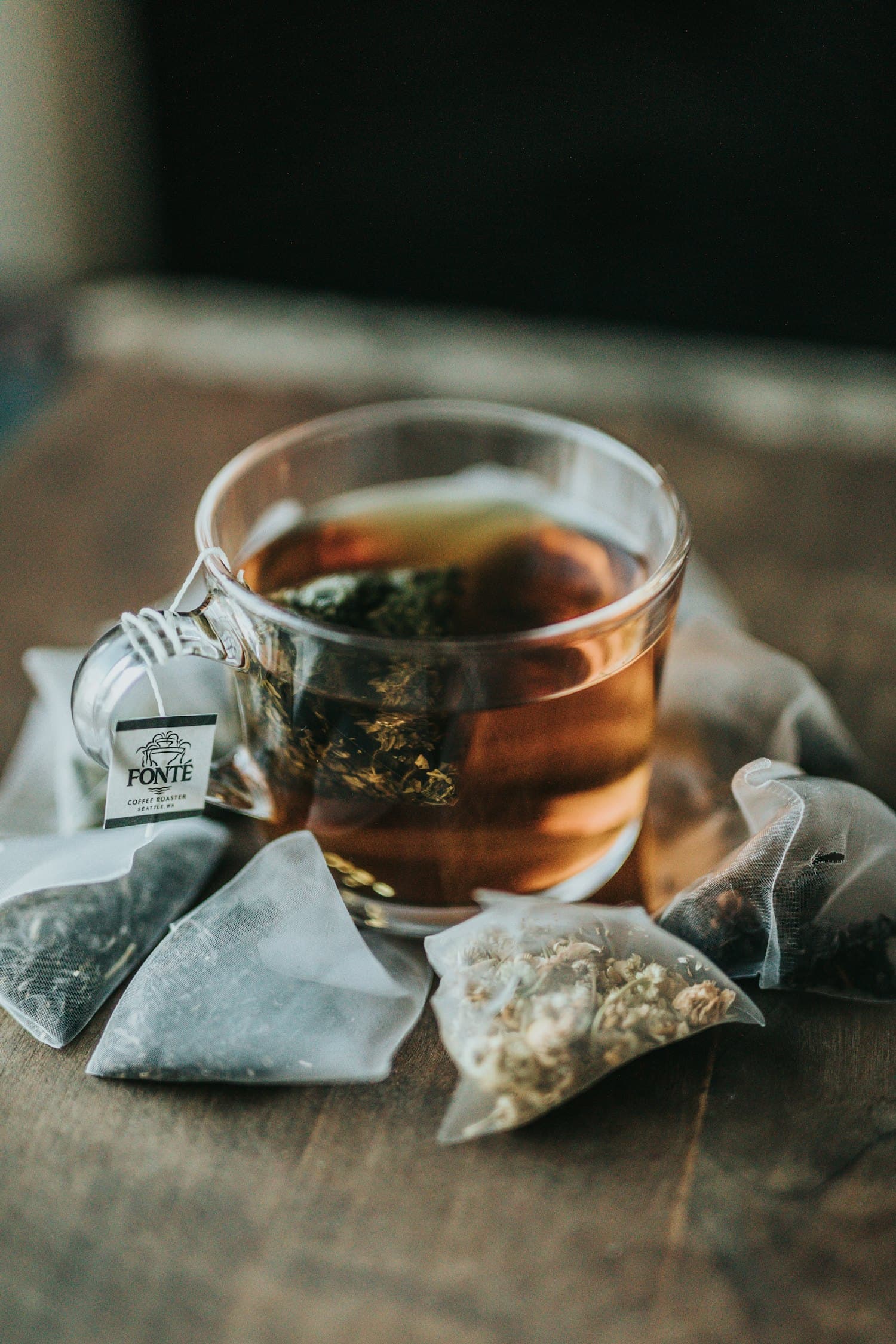 Glasses of spiced masala chai on a warm wooden table